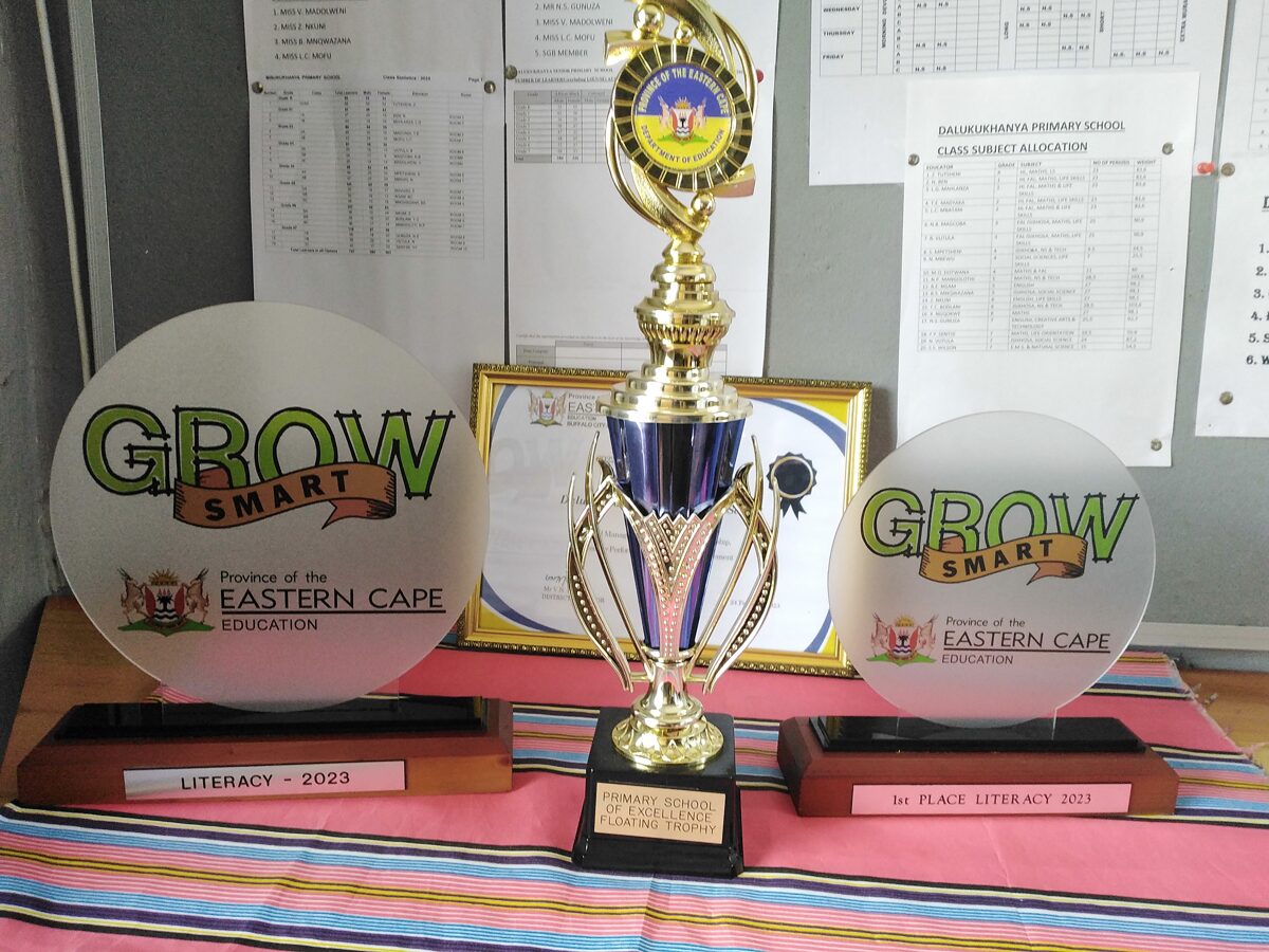 Grow Smart AND School Excellence trophies